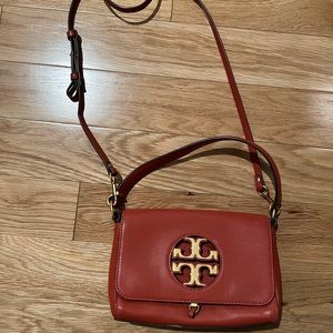 Great bag, beautiful color and in great shape. Used a couple of times.